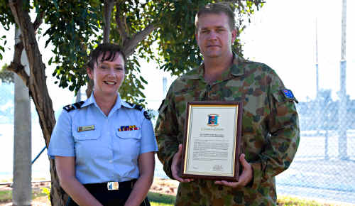 Former Gympie man Major Lyndon Jackson is awarded a Commander Joint Logistics Commendation by Air Vice Marshall (AVM) Margaret Staib. Former Gympie man Major Lyndon Jackson is awarded a Commander Joint Logistics Commendation by Air Vice Marshall (AVM) Margaret Staib.